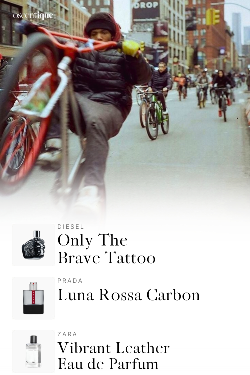 Urban street photo of a rider pulling a wheelie on a red bike in winter light, with blurred handlebars in the foreground.